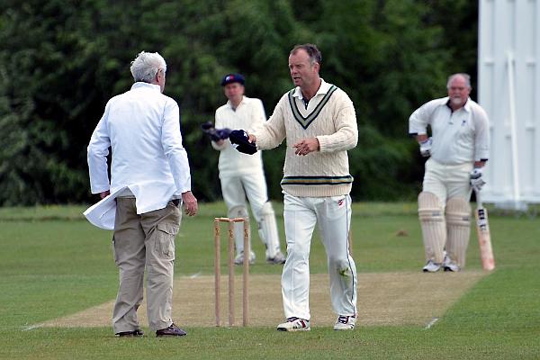 5 SA Chairman Peter Higgins prepares to bowl.jpg